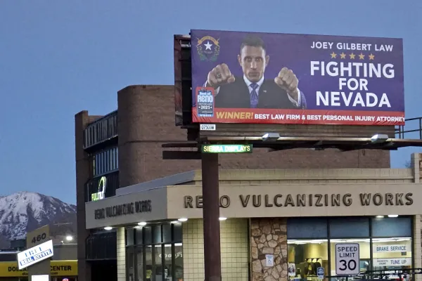 A billboard advertises legal services for Joey Gilbert, an attorney and former professional boxer, who is running for governo