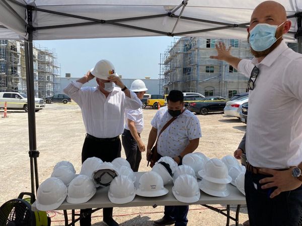 Gov. Steve Sisolak donned a hardhat in August for a tour of Decatur Commons, a Nevada HAND affordable housing development und