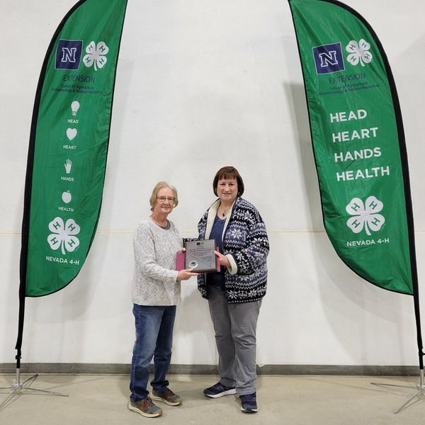 Prior to her recent award, Linda Zimmerman (left) was awarded the 2021 Nevada 4-H Volunteer of the Year by Sue Hoffman, execu